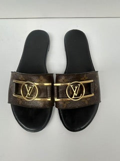LOUIS VUITTON LOCK IT FLAT SLIDES