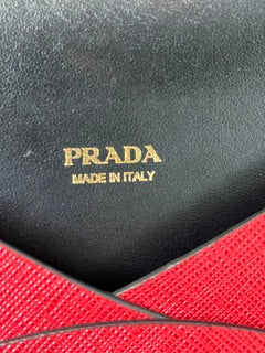 PRADA  RED CLUTCH W/ 2 INSERTS